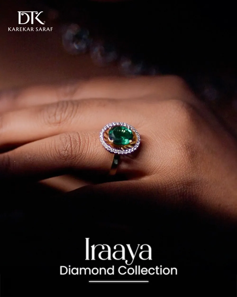 Iraaya emerald ring on a hand